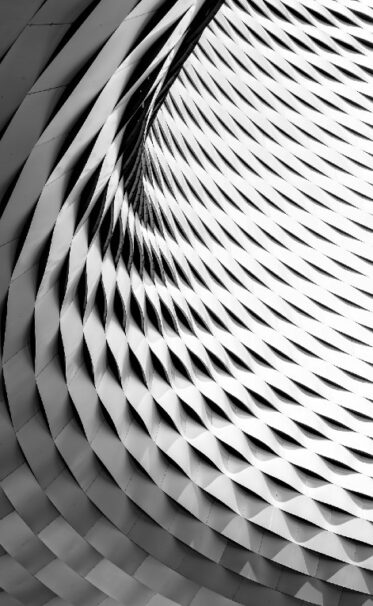 Abstract black and white geometric pattern with a spiral design